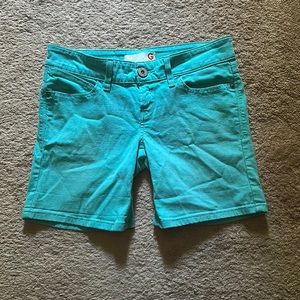 Guess teal long shorts, size 28
